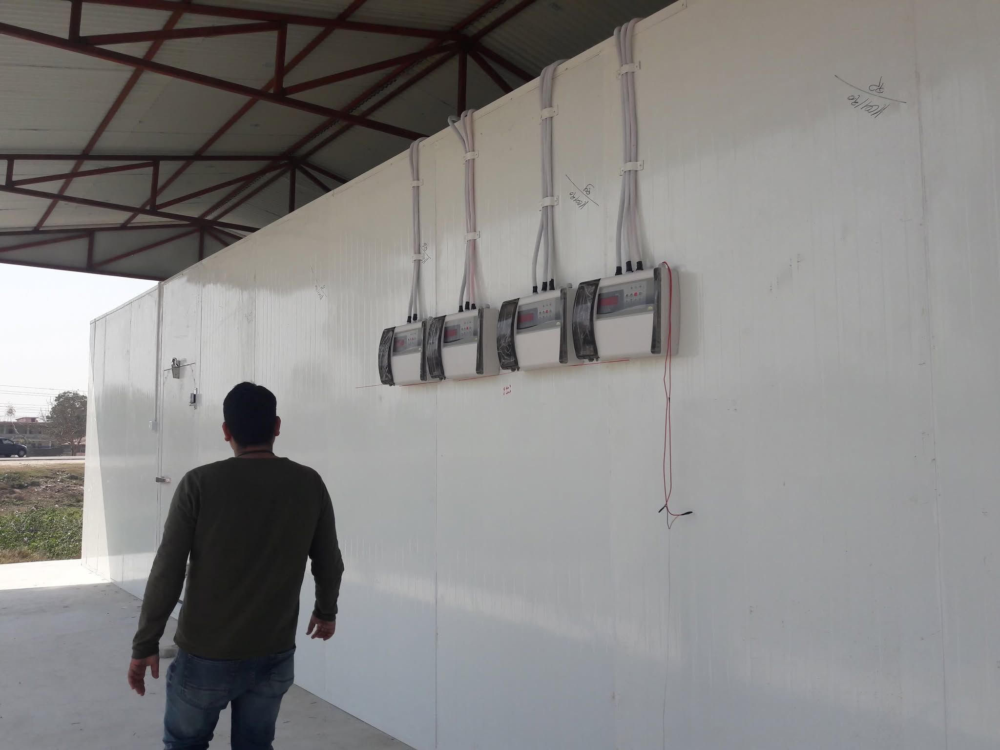 External control units on cold-room wall